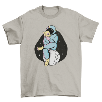 Astronaut reading a book t-shirt design